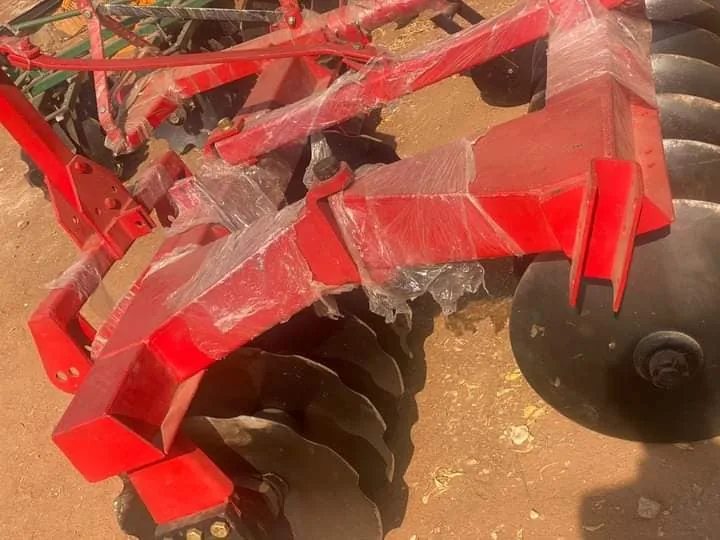 Red disc harrow frame and concave discs